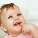 Признаки прорезывания зубов у детей
